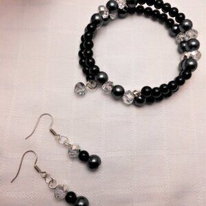 Handmade jewelry set with memory wire bracelets and asymetrical earrings